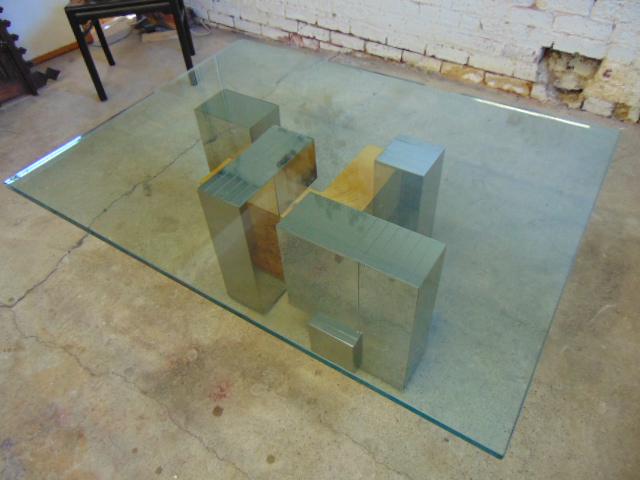 MCM coffee table, Evans Cityscape style, possible Milo: MCM coffee table, Evans Cityscape style, possible Milo Baughman, glass chipped, table is 36" by 48" (glass), height is 17.25", some metal panels on base are loose and / or bent.