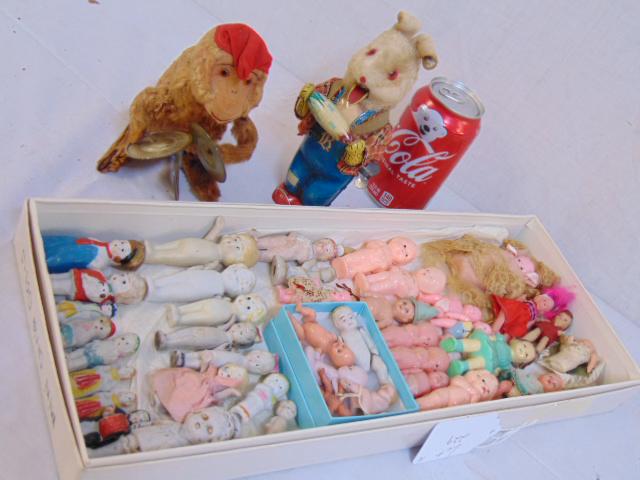 Toy, doll lot, 2 mechanical wind up toys & large: Toy, doll lot, 2 mechanical wind up toys & large assortment of small porcelain & plastic dolls.