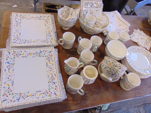 Toscana Gien France dishes to include 8 square plates;: Toscana Gien France dishes to include 8 square plates; 8 bowls; 10 mugs; 8 lunch plates; sugar & creamer lid missing, matching napkins.UPDATE: 4 square plates each have a chip in the corner, other pla
