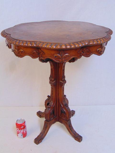 Carved side table, solid carved base, scalloped top,: Carved side table, solid carved base, scalloped top, label reads: "An Heirloom of Tomorrow Designed and Handcrafted by JAN. Slack & Company, Fifth Avenue, New York" height is 27"