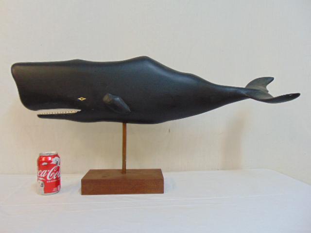 Folk art carved wood sperm whale, J. Brewer, paint: Folk art carved wood sperm whale, J. Brewer, paint decorated, glass eyes, repair to tail, on stand, whale is 35" long, signed on base, J. Brewer.