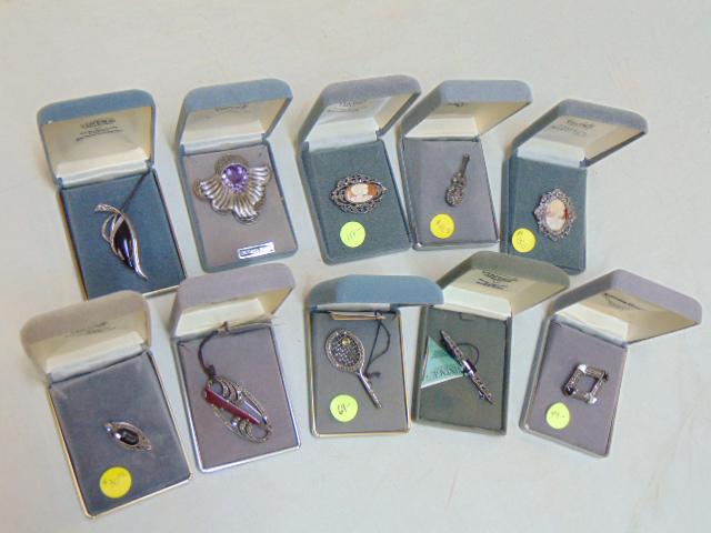 Jewelry. (10) sterling pins, 2 cameo & marcasite; large: Jewelry. (10) sterling pins, 2 cameo & marcasite; large sterling & amethyst; carnelian & marcasite, etc..
