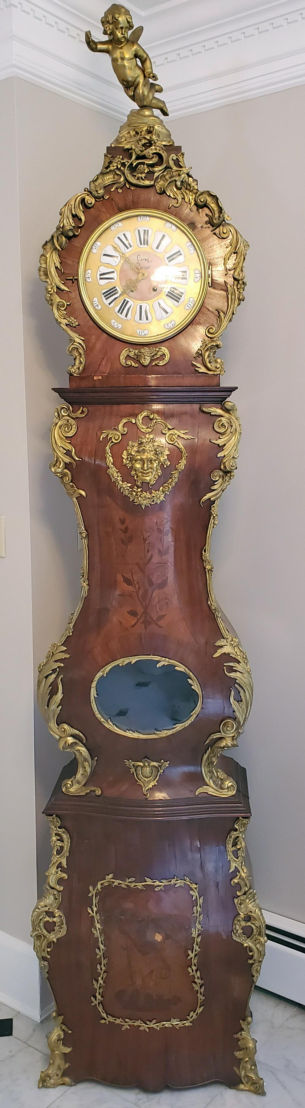 French tall case bronze mounted clock, fine quality: French tall case bronze mounted clock, fine quality bombe front cabinet inlaid clock, case signed "P. Bernard", bronze putti on top, marble and porcelain face, 101" tall, minor veneer damage, replaced