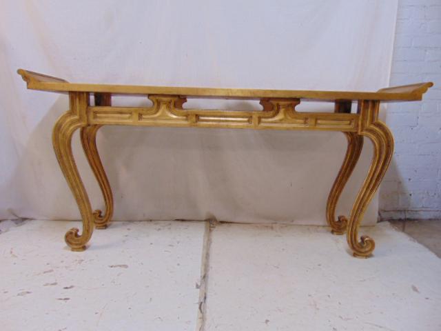 Gilt mirrored console or Hollywood table, curved legs,: Gilt mirrored console or Hollywood table, curved legs, smoky glass top, table is 64.5" by 15", height is 30.25"