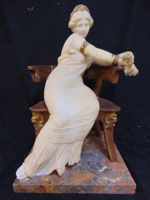 Carved alabaster statue of a seated woman, alabaster: Carved alabaster statue of a seated woman, alabaster figure on gilt wood chair, marble base, statue has multiple repairs, chair as well, height is 19.5"