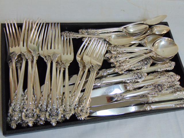 Sterling flatware, Wallace, Grand Baroque: Sterling flatware, Wallace Grand Baroque, service for 10, includes 10 dinner forks, 12 desert or tea spoons, 11 salad forks, 9 soup spoons, 67 troy plus 11 knives.