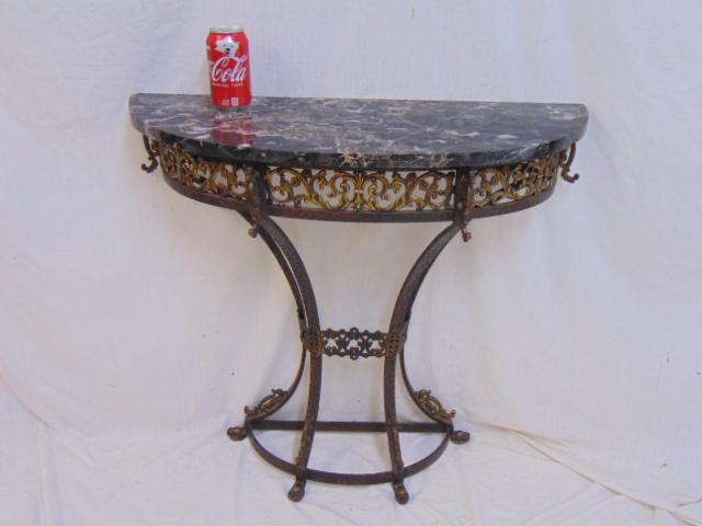 Oscar Boch marble top console table, metal & brass base: Oscar Boch marble top console table, metal & brass base with gilt detail, table is 30.75" by 11", height is 30.25", small chip on corner marble