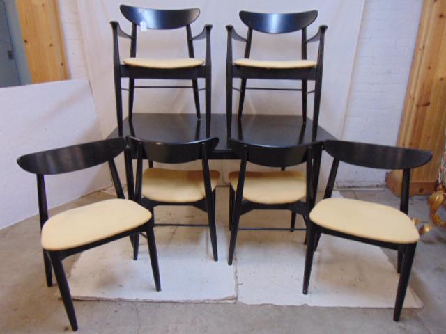 MCM table & 6 chairs, 2 arm, 4 side, in black paint,: MCM table & 6 chairs, 2 arm, 4 side, in black paint, table is 60" by 40", height is 29.25", old label on bottom chairs, table has no leaves