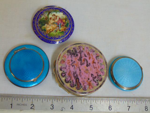 4 enameled compacts, 2 fine quality blue enamel: 4 enameled compacts, 2 fine quality blue enamel compacts, paint decorated compact with courting scene & compact with pink cover.