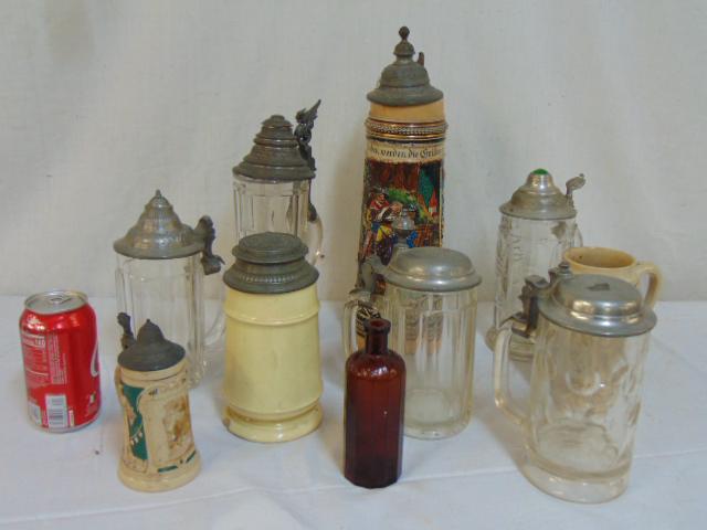 Lot German steins, glass & ceramic, decorative steins: Lot German steins, glass & ceramic, decorative steins with pewter lids, various sizes, also includes small "Kendall's Spavin Cure" quack bottle, amber glass.