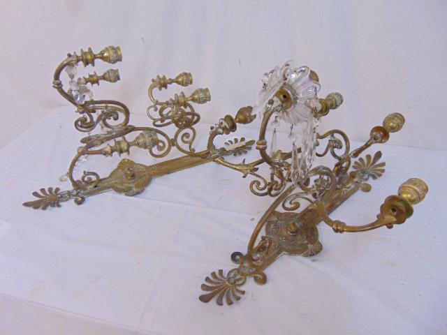 Pair brass wall sconces, 5 arm each, most crystals are: Pair brass wall sconces, 5 arm each, most crystals are missing, sconces are 21.75" tall