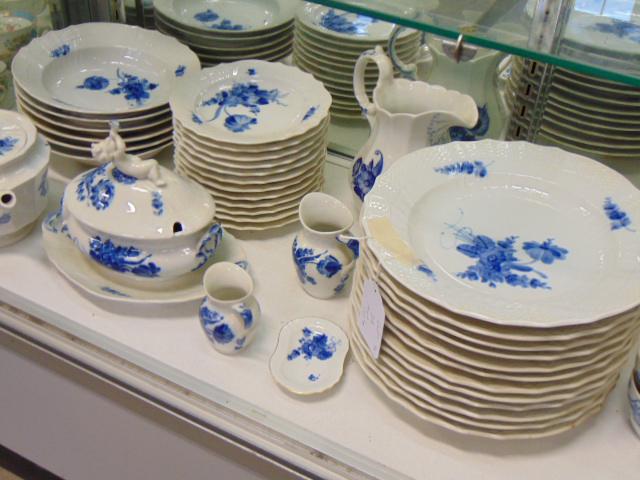 Set Royal Copenhagen porcelain dinnerware, "Blue Flower: Set Royal Copenhagen porcelain dinnerware, "Blue Flower Curved", includes teapot, pitcher, gravy bowl with putti, large tureen, 6 soup bowls, 12 bread plates, 11 cups & saucers, 12 10" dinner plates &