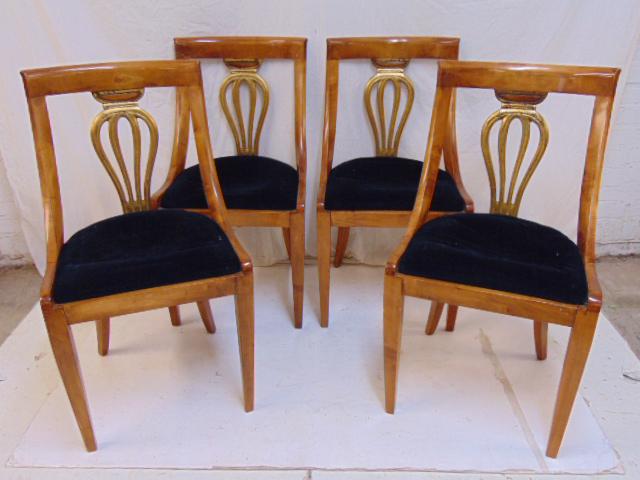 4 Biedermeier style chairs, curved back with gilt: 4 Biedermeier style chairs, curved back with gilt center, one chair has repair to top back, otherwise in good condition.