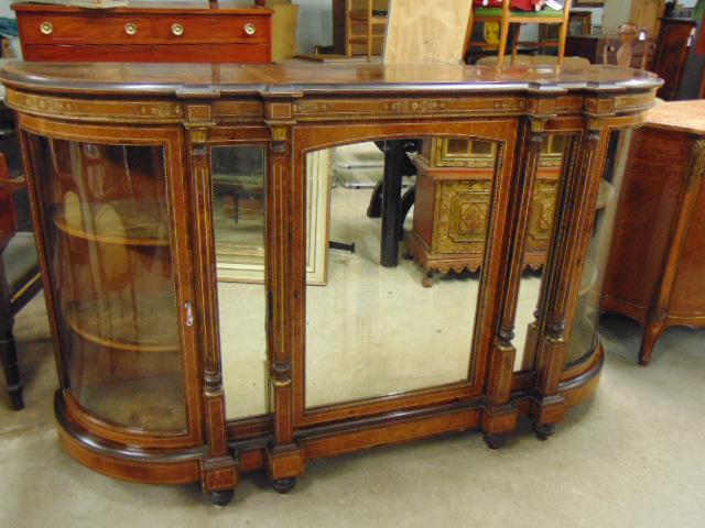 Fine quality 19th Century sideboard, curved glass ends,: Fine quality 19th Century sideboard, curved glass ends, burl veneers, inlaid brass detail, mirrored doors, carved & inlaid columns, cabinet is 70.25" wide, 19" deep, height is 41.75".