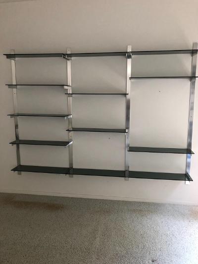 Aluminum & glass shelf unit, 4 aluminum rails, each: Aluminum & glass shelf unit, 4 aluminum rails, each rail is 72", comes with 13 smoke glass shelves, each shelf is 9" by 32"