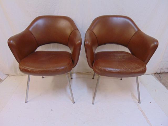 Pair Knoll, Saarinen leather chairs, MCM executive: Pair Knoll, Saarinen leather chairs, MCM executive leather arm chairs, some wear on leather, no tears or rips.