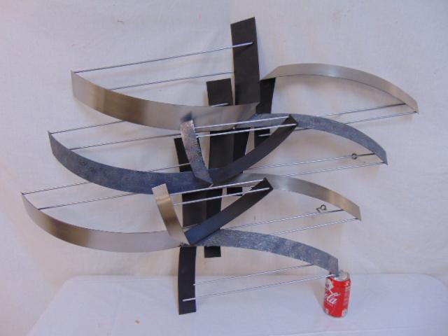 Curtis Jere metal abstract wall sculpture, mixed: Curtis Jere metal abstract wall sculpture, mixed patinas, brushed, textured and black paint, sculpture is 32" by 44".