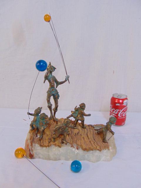 Curtis Jere sculpture, Pied Piper, figures with: Curtis Jere sculpture, Pied Piper, figures with balloons, on stone base, 5 individual figures, two with balloons, stone base is 11" by 6.5", two balloons are loose.