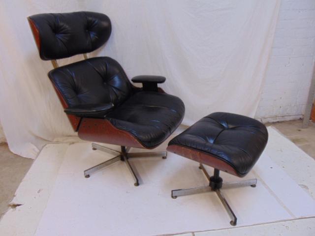 Plycraft chair & ottoman, mahogany shell, black leather: Plycraft chair & ottoman, mahogany shell, black leather covering, worn, damage on corner right arm rest, ottoman shell is as is.