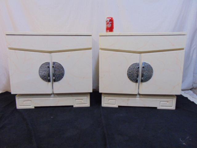 Pair white MCM nightstand cabinets, manner of Mont,: Pair white MCM nightstand cabinets, manner of Mont, single drawer over two doors, faux white marble finish, 25.5" by 16.25", height is 24.75", illegible label in drawer