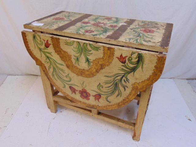 Paint decorated drop leaf table, appears Scandinavian,: Paint decorated drop leaf table, appears Scandinavian, table is 35.5" by 17.75" (leaves down), and 35.5" by 57.25" with leaves up, has two drawers, painted with floral scenes, paint chipped, one swing
