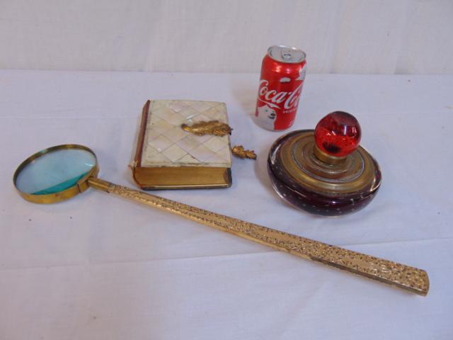 Art Glass inkwell, magnifying glass & MOP clad album,: Art Glass inkwell, magnifying glass & MOP clad album, red bubble glass & bronze inkwell, magnifying glass with 15.5" gold toned handle & early photo album covered in Mother of Pearl, 6" by 4.75", some