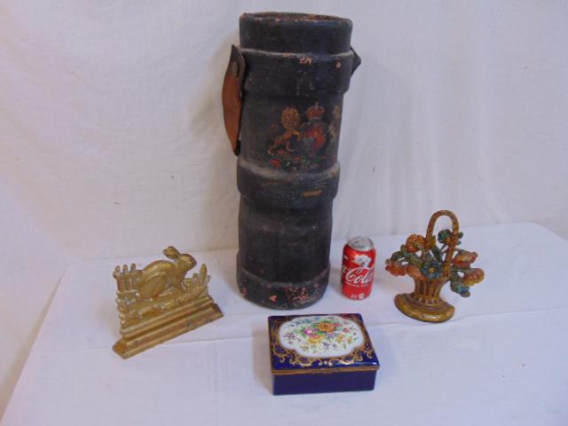 Fire bucket, porcelain box & 2 doorstops, canvas &: Fire bucket, porcelain box & 2 doorstops, canvas & paint decorated fire bucket with armorial decoration & leather handle, porcelain floral decorated box, brass bunny doorstop & cast iron floral basket