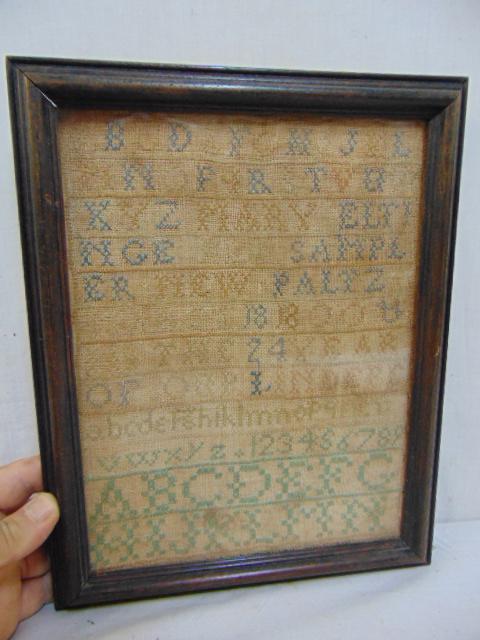 Antique needlepoint sampler, faded, New Paltz, 1818: Antique needlepoint sampler, faded, New Paltz, 1818 (?), 10.75" by 8.25".