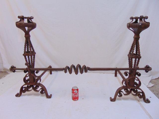 Pair wrought iron arts & crafts andirons with crossbar,: Pair wrought iron arts & crafts andirons with crossbar, rusted patina, andirons are 29.5" tall.