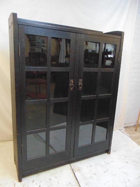 Early signed Gustav Stickley ebonized double door: Early signed Gustav Stickley ebonized double door bookcase, original hardware, with key, bookcase is 42" by 13", height is 56", in good condition, mission furniture, arts & crafts.