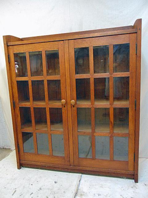 Signed Gustav Stickley double door oak bookcase,: Signed Gustav Stickley double door oak bookcase, cleaned finish, some small burn marks & watermarks on top cabinet, mission oak, arts & crafts bookcase is 48.75" by 12", height is 56", signed.