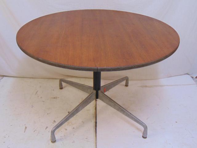 Round George Nelson for Herman Miller aluminum and: Round George Nelson for Herman Miller aluminum and mahogany table, top is 42" in diameter, height is 28.5"