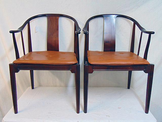 Pair Hans Wegner for Fritz Hansen chairs, "Chinese: Pair Hans Wegner for Fritz Hansen chairs, "Chinese Chairs", 1982, webbed seat with leather pillow, each chair is 22.5" by 21,5" (seat 17"), height is 32", few scratches, otherwise in good condition.