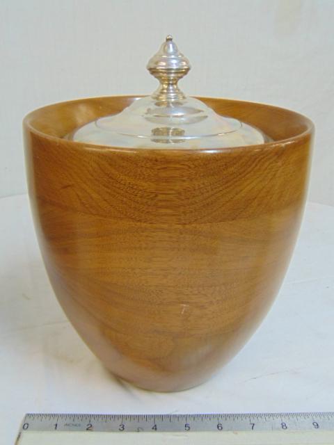 Cartier sterling silver lidded ice bucket, in wood with: Cartier sterling silver lidded ice bucket, in wood with glass liner, in original box, ice bucket is 11.25" tall.
