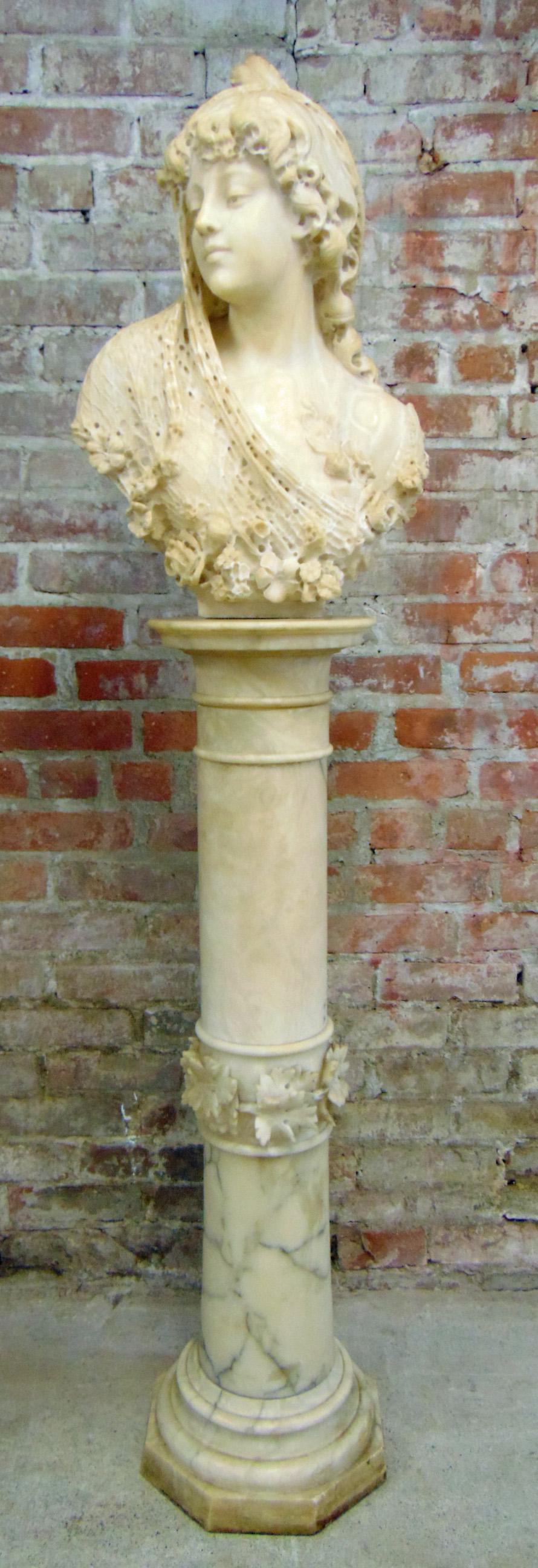 Carved art nouveau alabaster bust of woman: Carved alabaster art nouveau bust of woman with lace hair cover on alabaster pedestal, bust is unsigned, height bust is 22", height pedestal is 40", few small chips, scrapes, overall in good condition