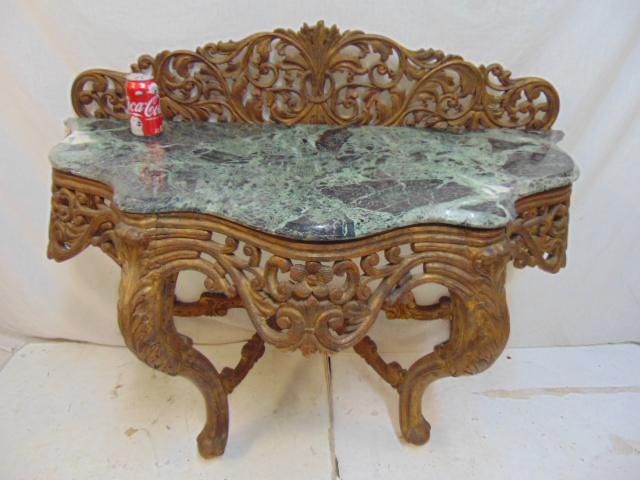 Marble top console table, gilt base, base is loose, few: Marble top console table, gilt base, base is loose, few breaks in support structure, marble good, table is 48" by 22" (marble), height is 39"