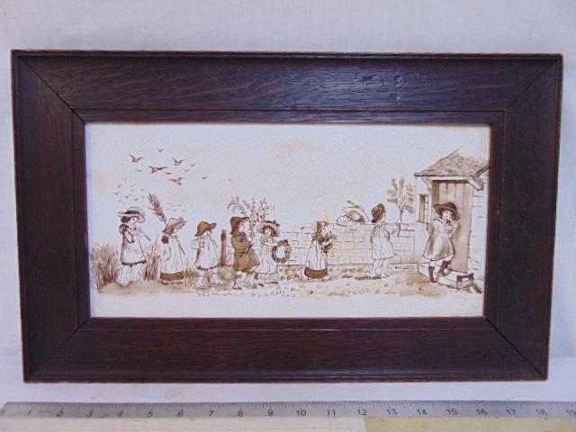 Oak framed Minton pottery tile, in brown & white,: Oak framed Minton pottery tile, in brown & white, various children, 7" by 14.5" (measured from , tile only)