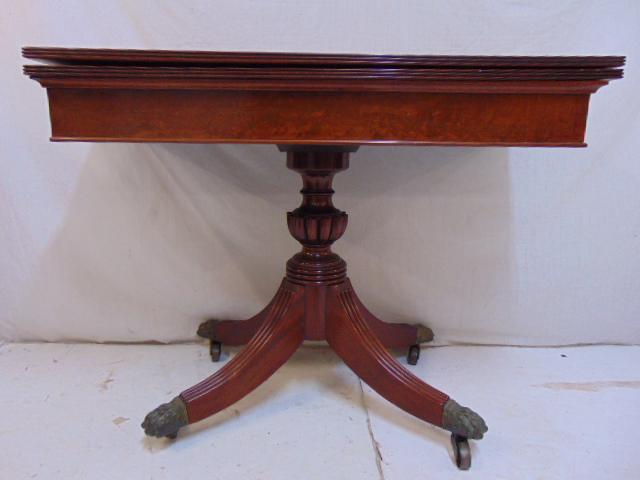 Baltimore mahogany card table, sabre leg table, late: Baltimore mahogany card table, sabre leg table, late Federal period, circa 1815-1825, with various documentation, table is 37.5" by 18.25", height is 28.5".