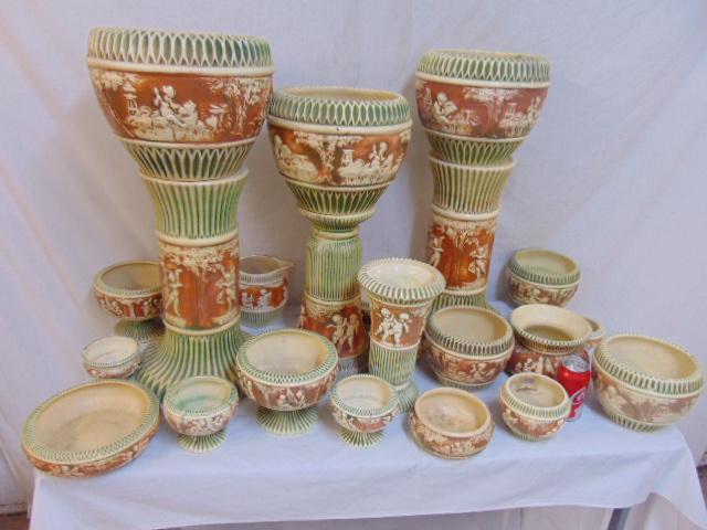 Large collection Roseville Donatello, includes 3: Large collection Roseville Donatello, includes 3 Jardiniere & pedestals, spittoon, 3 small planters, various bowls, some cracks, sold as collection.