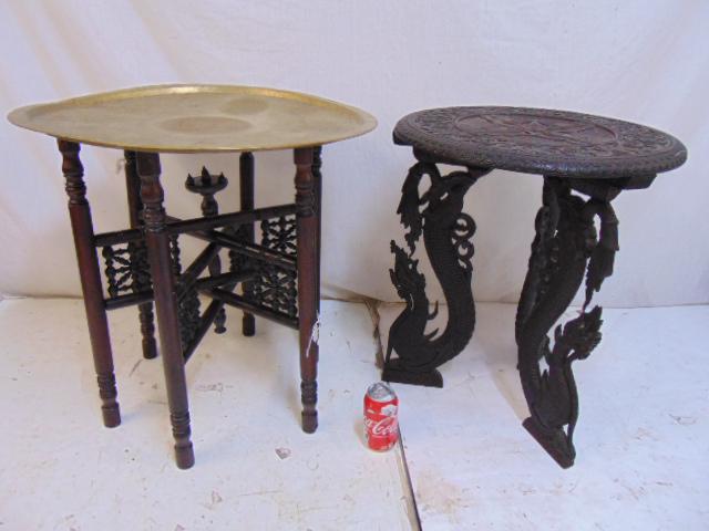 2 Eastern style stands, folding base brass tray top: 2 Eastern style stands, folding base brass tray top Moroccan table (top diameter is 23.5" & carved wood stand, Indian, Indonesian (??), with ornate carved dragon legs & carved top with peacocks, 20" i