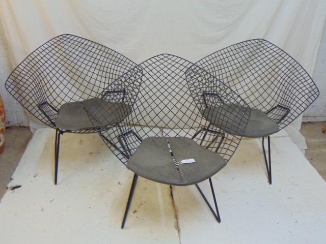 3 Bertoia for Knoll diamond chairs, in black, with: 3 Bertoia for Knoll diamond chairs, in black, with original seats, 33" by 32" (measured from front), 30.25 height excellent condition leather seats are original, padding is a little dry and some stain