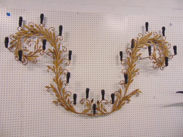 Large double candle sconse, gilt painted wrought iron: Large double candle sconse, gilt painted wrought iron curved sconce with leaf decoration, two halves meet at base, sconce is 78" wide, 45" tall, can be used as two separate sconces, they are connected