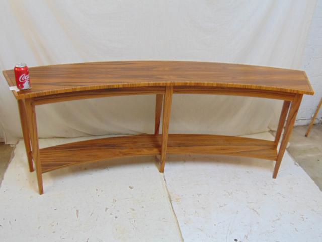 Curved sofa table, art deco style, exotic wood, with: Curved sofa table, art deco style, exotic wood, with lower shelf, table is 72.75" by 14", height is 27"