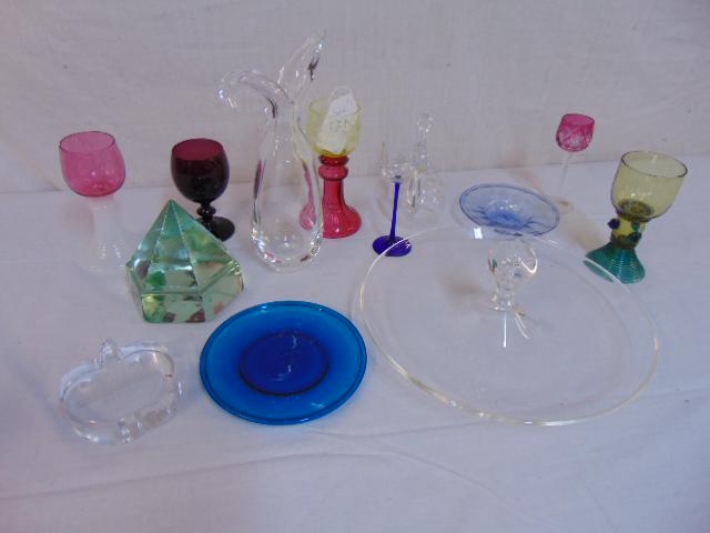 Large glass lot, Cartier, Steuben & more, includes: Large glass lot, Cartier, Steuben & more, includes Steuben pitcher, Cartier "Big Apple" paperweight with etched skyline; crystal bell, several saucers; 11" glass bowl with center knob (appears Steuben