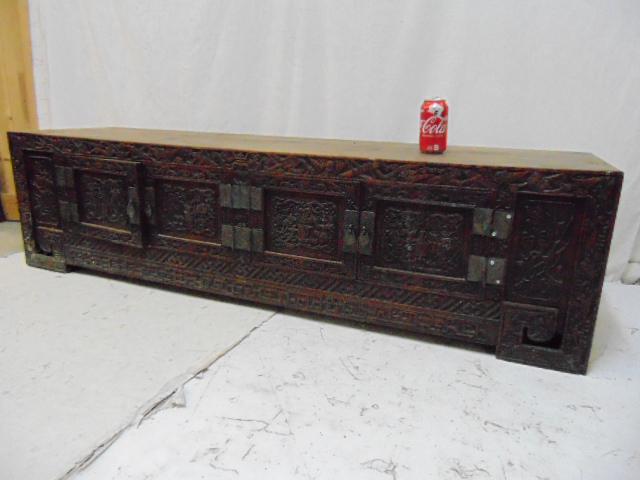 Carved Chinese cabinet, low cabinet with 4 doors,: Carved Chinese cabinet, low cabinet with 4 doors, carved decorations, screws replaced on hinges, cabinet is 61.75" by 16.5", height is 16.25"