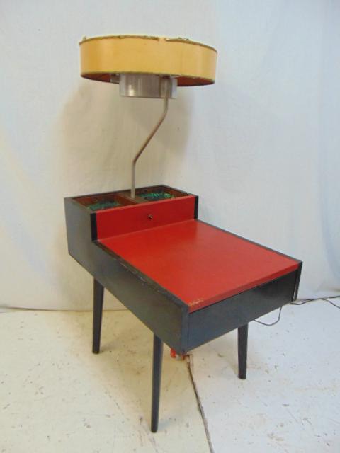 George Nelson Herman Miller Planter Lamp Table, black: George Nelson Herman Miller Planter Lamp Table, black painted with red leather surface, with two copper planter inserts, some damage to leather (images), stand is 30" by 19", height (excluding light) 