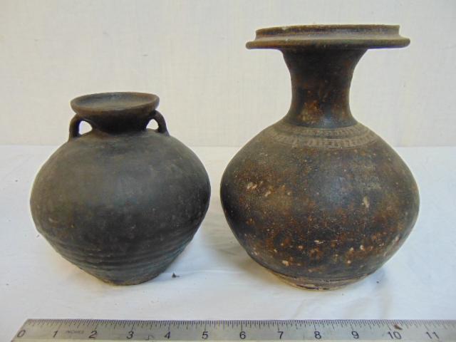 Two early Chinese pottery vases, pre-dynastic (?): Two early Chinese pottery vases, pre-dynastic (?) earthenware vases 7 7/8" & 5 7/7" tall, minor chip on rim of larger vase. Note this lot was acquired in China before 1982 by an American journalist