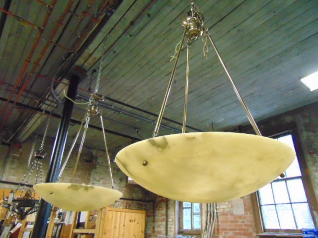 2 hanging alabaster chandeliers, pair dish or dome: 2 hanging alabaster chandeliers, pair dish or dome style alabaster hanging fixtures suspended on 3 rods, each fixture is 23" in diameter, height is 35" approximately, in good condition.