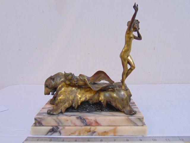Carl Kauba bronze Bare on Bear, mechanical sculpture,: Carl Kauba bronze Bare on Bear, mechanical sculpture, on marble base, signed "C. Kauba" on the tail of bear pelt, the erotic bronze figural sculpture depicting a reclining female in a long draped gown