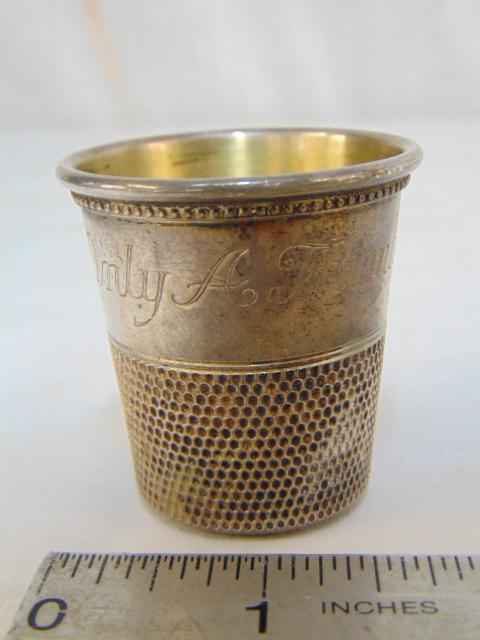 Cartier sterling silver Thimble shot glass, "Only A: Cartier sterling silver Thimble shot glass, "Only A Thimble Full" marked sterling Cartier, gold wash interior, 1.3 troy oz